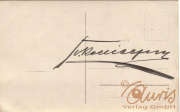 Eine künstlerische Signatur mit Schwung auf einem Briefkarton