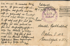 Historische Postkarte aus Berlin mit handschriftlichem Brief und Stempeln