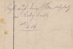 Eine handgeschriebene Notiz auf einer alten Postkarte aus dem Jahr 1916