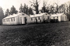 Heer zeigt militärische Unterkünfte in einem Camp während des frühen 20. Jahrhunderts