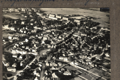 Historische Luftaufnahme des Stadtzentrums während des Ersten Weltkriegs mit dem Fotoalbum Aus grosser Zeit