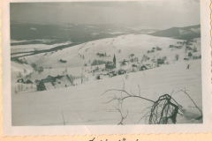 Winterlandschaft Schigerlande mit Dorf und Kirchturm