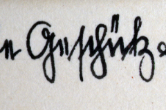 Handschriftliche Beschriftung auf Fotorückseite