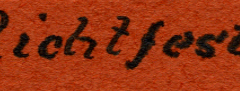 Handschriftliche Beschriftung 'Richtsest' auf orangefarbenem Untergrund