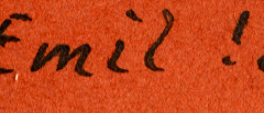 Handschriftliche Notiz 'Emil' auf orangefarbenem Untergrund