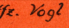 Handschriftliche Beschriftung auf orangefarbenem Untergrund