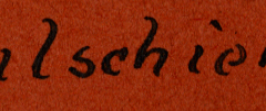 Handschriftliche Beschriftung 'Schießschießen' auf rotem Untergrund