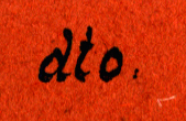 Handschriftliche Notiz auf rotem Untergrund