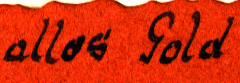Handschriftliche Notiz auf rotem Untergrund