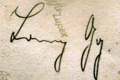 Handschriftliche Signatur auf Fotorückseite