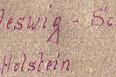Handschriftliche Beschriftung auf Textil oder Papier