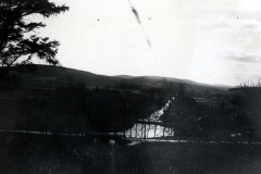 Flusstal mit Waldbestand und Hügellandschaft